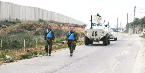  ?? — Reuters photo ?? UN peacekeepe­rs (UNIFIL) patrol the border with Israel near the village of Kfar Kila, Lebanon.