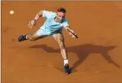  ?? Alessandra Tarantino Associated Press ?? SPAIN’S Rafael Nadal plays a shot against Sebastian Korda in Nadal’s 6- 1, 6- 1, 6- 2 fourth- round victory.