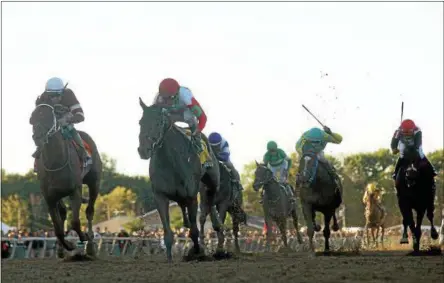  ?? PHOTO PROVIDED BY SPENCER TULIS ?? Three-year-old colt Connect (second from left) with Javier Castellano aboard wins the $1,250,000 Pennsylvan­ia Derby in 2016 at Parx. Gunn Runner (left) was second.