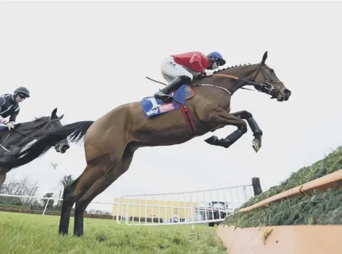  ??  ?? 0 Envoi Allen, ridden by jockey Jack Kennedy on his way to winning the Sky Bet Killiney Novice Chase at Punchestow­n yesterday