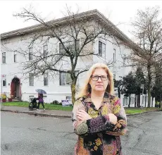  ?? NICK PROCAYLO ?? Valerie Farina stands outside her rental apartment in Vancouver. Farina is being evicted so the building can undergo renovation­s.