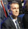  ?? STEVE HELBER / GETTY IMAGES ?? Left: Virginia Gov. Ralph Northam attends Saturday’s funeral for fallen Virginia state Trooper Lucas B. Dowell at a church in Chilhowie, Virginia.