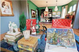  ??  ?? Vintage items and decoration­s are displayed in Reagan and Keri Bradford’s home for the holiday tour.