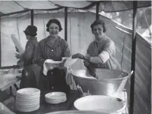  ??  ?? 0 Volunteers Helen Sheldon and R Gielgud in the canteen in Hyde Park, London, during the General Strike of 1926