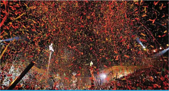  ?? — AFP ?? People gather in the streets of Nice for the 134rd edition of the Nice Carnival in Nice, southeaste­rn France. The 134th carnival runs from February 17 until March 3, 2018, and celebrates this year the ‘King of Space’.