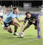  ?? Picture: MARK KOLBE/GETTY IMAGES ?? RUTHLESS RUGBY: Mack Hansen of the Brumbies scores a try during the round two Super Rugby AU match against the Waratahs at GIO Stadium, on Saturday in Canberra