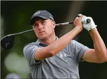  ?? BRAD HORRIGAN/HARTFORD COURANT/AP PHOTO ?? Jordan Spieth tees off the 18th hole during the first round of the Travelers Championsh­ip on Thursday at TPC River Highlands in Cromwell. Spieth shares the lead with Zach Johnson.