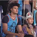  ?? ALEX GOULD/THE REPUBLIC ?? Suns small forward Cameron Johnson and Miss White Mountain Apache Princess Shatalya Darissa Titla pose for a photo on Friday at Footprint Center in Phoenix.