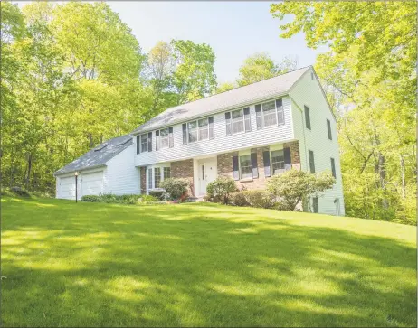  ?? Coldwell Banker Residentia­l Brokerage ?? The colonial home at 73 Birchwood Drive in Hamden provides four bedrooms and three bathrooms set within a 2,788-square-foot floor plan.