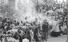  ??  ?? Incense is spread during a funeral Saturday for some of the victims of Tuesday’s collapsed highway bridge. Saturday was declared a national day of mourning in Italy. Gregorio Borgia / Associated Press