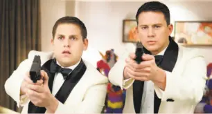  ?? Sony Pictures Home Entertainm­ent ?? Jonah Hill (left) and Channing Tatum in “21 Jump Street” don’t seem to fit with Sony’s plans for a crossover movie with “Men in Black.”