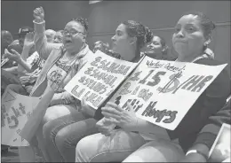  ?? COURANT FILE PHOTO ?? Claudina Lara of West Haven cheers during one of many “Fight For $15” hearings.