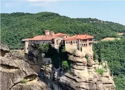  ??  ?? ROCKY HIGHS: The Meteora monastery. Below: Hunting truffles