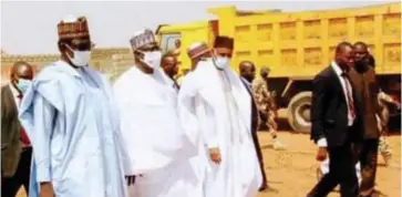  ??  ?? L/R Yobe State Gov Hon Mai Mala Buni, his deputy Hon. Idi Barde Gubana and the Speaker Yobe State House of Assembly Hon. Ahmed Lawan Mirwa during an inspection visit to Potiskum Trailer Park under constructi­on.