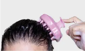  ?? Images ?? Silicone scalp massagers feel pleasurabl­e, but evidence they improve hair growth ‘is anecdotal at this point’, says pharmaceut­ical scientist Hannah English. Photograph: AMphotogra­phy/Getty