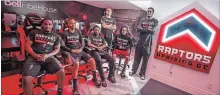  ?? TIJANA MARTIN
THE CANADIAN PRESS ?? Raptors Uprising GC Seanquai Harris, left to right, Joshua McKenna, Kenneth Hailey, Christophe­r Doyle, Trevion Hendrix, and Yusuf Abdulla pose for a photo at their Bell Fibe House in Toronto on Thursday.