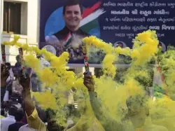  ?? — PTI ?? Congress party workers celebrate the party’s good show in Assembly elections of Rajasthan, Chhattisga­rh and Madhya Pradesh, in Ahmedabad on Tuesday.