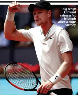  ??  ?? Big scalp: Edmund raises a fist in triumph after a huge victory