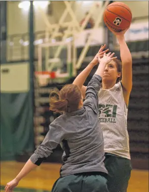  ?? JASON MALLOY/THE GUARDIAN ?? Victoria Barbour gets a hand in Karla Yepez’s face as the forward takes a shot during Wednesday’s UPEI Panthers women’s basketball practice.