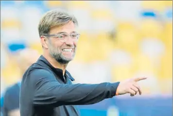  ?? FOTO: EFE ?? Jürgen Klopp respeta pero no teme al Madrid El técnico alemán aspira a conquistar su primer Champions