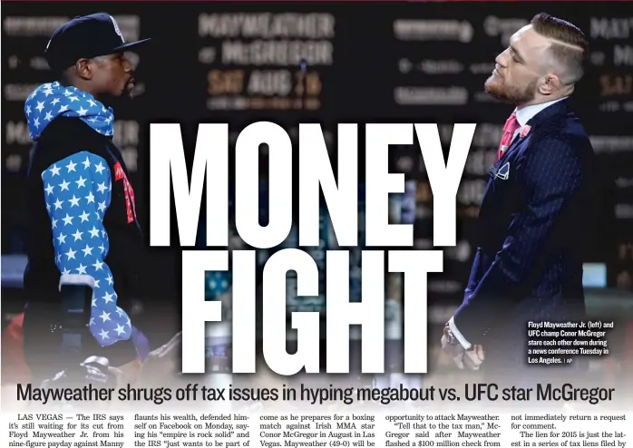  ?? | AP ?? Floyd Mayweather Jr. ( left) and UFC champ Conor McGregor stare each other down during a news conference Tuesday in Los Angeles.