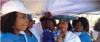  ?? Photo: Contribute­d ?? For the people… A file picture of the late Ovaherero Queen Meriam Rukoro with a visually impaired child at a donation handover.