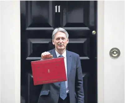  ??  ?? UNDER FIRE: Chancellor Philip Hammond had been trying to make a point about technologi­cal change