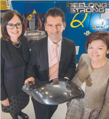  ?? Picture: JAY TOWN ?? RESEARCH BOOST: MP Sarah Henderson, Quickstop managing director David Marino and Deakin’s Jane den Hollander with the new carbon fibre manufactur­ing machine.