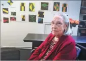  ?? AFP ?? Pioneer Cuban-American artist Carmen Herrera, 101, poses for photos while being interviewe­d in her studio on Jan 4, in New York.