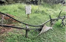  ??  ?? Left, the old plough at the entrance to the Bridge to Nowhere and, right, a hut on Blue Duck Station originally occupied by settler farmers.