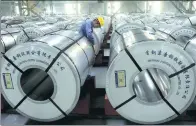  ?? JI CHUNPENG / XINHUA ?? A worker at a workshop of the Shougang Group in Caofeidian, Tangshan, Hebei province.