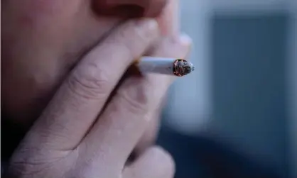  ??  ?? Smoking costs the economy about £13bn a year, £3bn of that in NHS and social care costs. Photograph: Jonathan Brady/PA