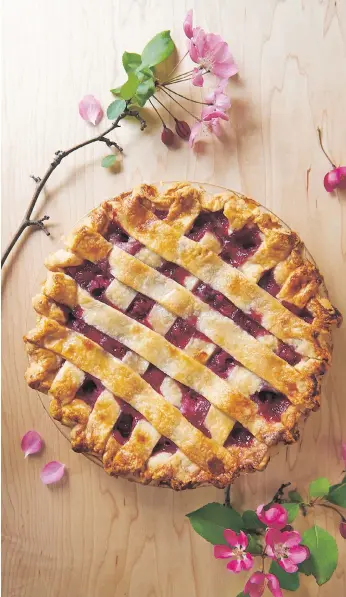  ?? AMANDA GALLANT/AG PHOTOGRAPH­Y ?? Inspired to make something special for those you love? Try pie! “It’s beautiful, easy and really lovely for Valentine’s Day,” Giselle Courteau says of the red-hued, lattice-topped treat.