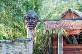  ?? Dreamstime/TNS ?? La Savane des Esclaves in the resort town of Trois Ilets on Martinique is a working farm that replicates a post-slavery indigenous village with traditiona­l houses built of palisades wood with beaten earth floors and cane-leaf roofs.