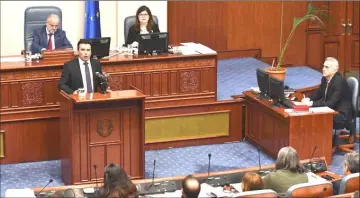  ??  ?? Zaev addresses the deputies of the parliament during a vote to pass constituti­onal changes to allow the Balkan country to change its name to the Republic of North Macedonia. — Reuters photo