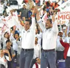  ?? |PUBLIMETRO ?? Miguel Castro Reynoso, candidato a la gubernatur­a del PRI, con el aspirante a la presidenci­a municipal de Zapopan, Abel Salgado.