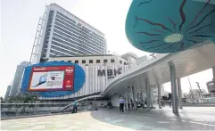  ?? WICHAN CHAROENKIA­TPAKUL ?? The deserted skywalk at MBK mall as tourists cancel travel plans during the coronaviru­s outbreak.