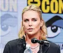  ?? [PHOTO BY RICHARD SHOTWELL, INVISION/AP] ?? Charlize Theron speaks on a panel July 22, day three of Comic-Con Internatio­nal in San Diego.