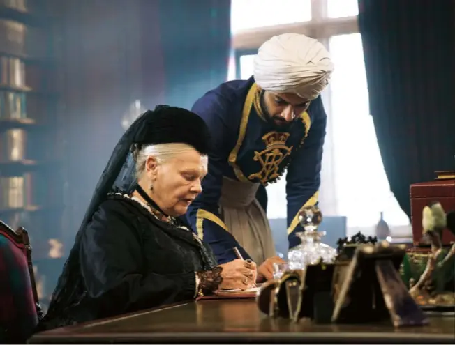  ??  ?? From left Judi Dench as Victoria and Ali Fazal as Abdul Karim in Stephen Frears’s Victoria And Abdul; the real Karim