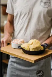  ??  ?? Joanna Gaines’ signature fluffy biscuits styled with a side of strawberry butter.