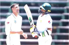  ?? — AFP photo ?? Duanne Olivier (centre) celebrates next to Pakistan batsman Mohammad Abbas during the second day of the third Cricket Test match between South Africa and Pakistan at Wanderers cricket stadium in Johannesbu­rg, South Africa.