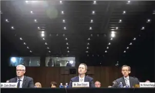  ??  ?? Colin Stretch, general counsel at Facebook, Sean Edgett, acting general counsel at Twitter, and Richard Salgado, director of law enforcemen­t and informatio­n security at Google, testify during a Senate Judiciary Subcommitt­ee on Crime and Terrorism...