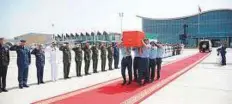  ?? WAM ?? The body of martyr First Sergeant Nasser Garib Al Mazroui arrives at Al Bateen Airport in Abu Dhabi yesterday.