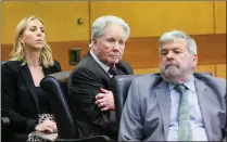  ?? MARTINEZJI­MENEZ@AJC.COM MIGUEL MARTINEZ /MIGUEL. ?? Former attorney Claud “Tex” Mciver, seated between his lawyers Amanda R. Clark Palmer and Donald F. Samuel, faces prospectiv­e jurors Monday in his murder retrial over the September 2016 fatal shooting of his wife, Diane Mciver.