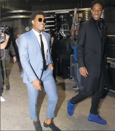  ?? JAYNE KAMIN-ONCEA/GETTY IMAGES ?? Raptors Kyle Lowry and DeMar DeRozan arrive at the NBA all-star game at the Staples Center on Sunday. DeRozan and Lowry’s team lost to Dwane Casey’s team 148-145.