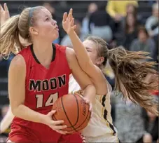  ?? Steph Chambers/Post-Gazette ?? A 6-foot-2 forward, Moon's Emma Theodorsso­n is a force inside for the Tigers.