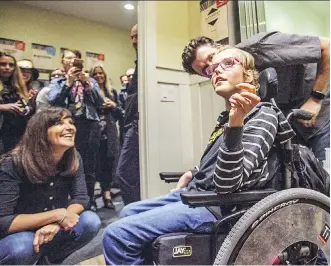  ?? PHOTOS: KERIANNE SPROULE ?? Clare Jackson, 9, rides the elevator for the first time in her new accessible home. Jackson will now be better equipped to live with cerebral palsy, scoliosis and other medical challenges.