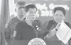  ?? PHILSTAR.COM ?? President Rodrigo Duterte is seen showing his so-called “narcolist” during one of his speeches.