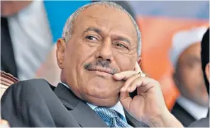  ??  ?? Saleh and (below) the aftermath of clashes in 2015 between fighters loyal to his successor President Hadi and Houthi rebels with whom Saleh entered a tactical alliance