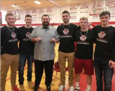  ?? SUBMITTED PHOTO ?? From left in black, VVS volleyball team members Ryan Shantal, Gavin Miller, Adam Durfee, Cole Smith, and Eli Creedon enjoy a visit from Detroit Lions head coach Matt Patricia, who shows off his Super Bowl rings during a surprise visit to his alma mater on Friday, Feb. 8.